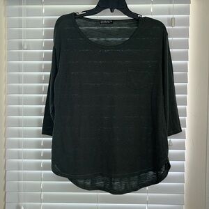 Green half sleeve t-shirt with pocket.